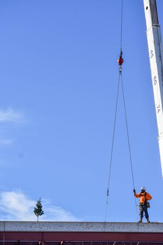 Worker on the beam